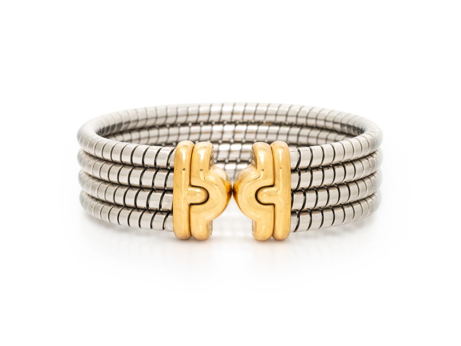 BULGARI, 'PARENTESI', STAINLESS STEEL AND YELLOW GOLD CUFF BRACELET