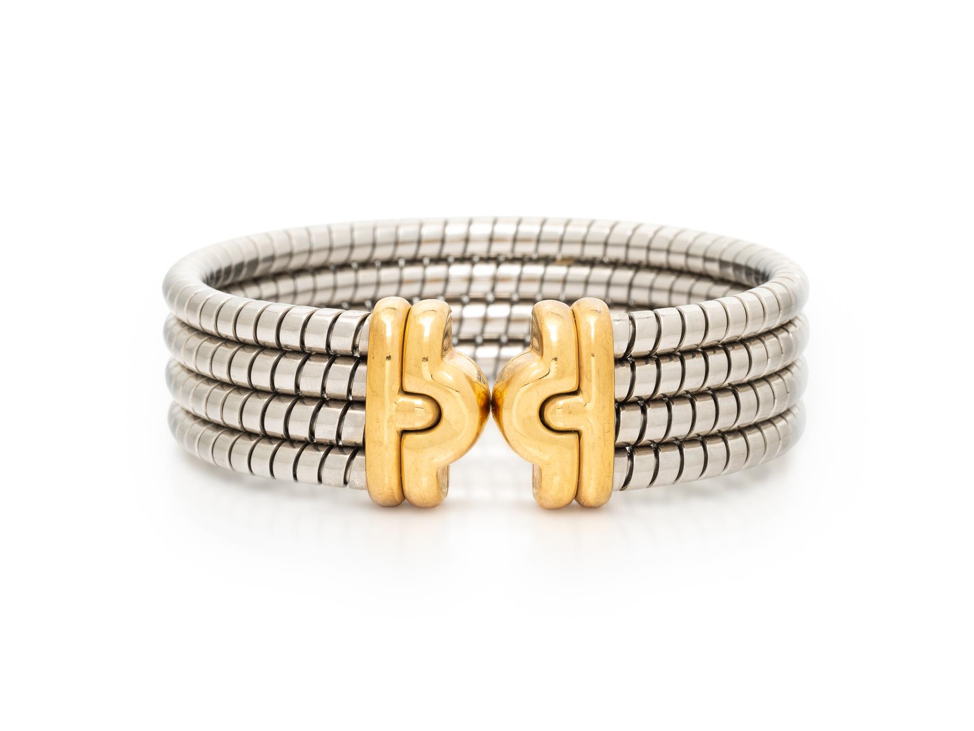 BULGARI, 'PARENTESI', STAINLESS STEEL AND YELLOW GOLD CUFF BRACELET