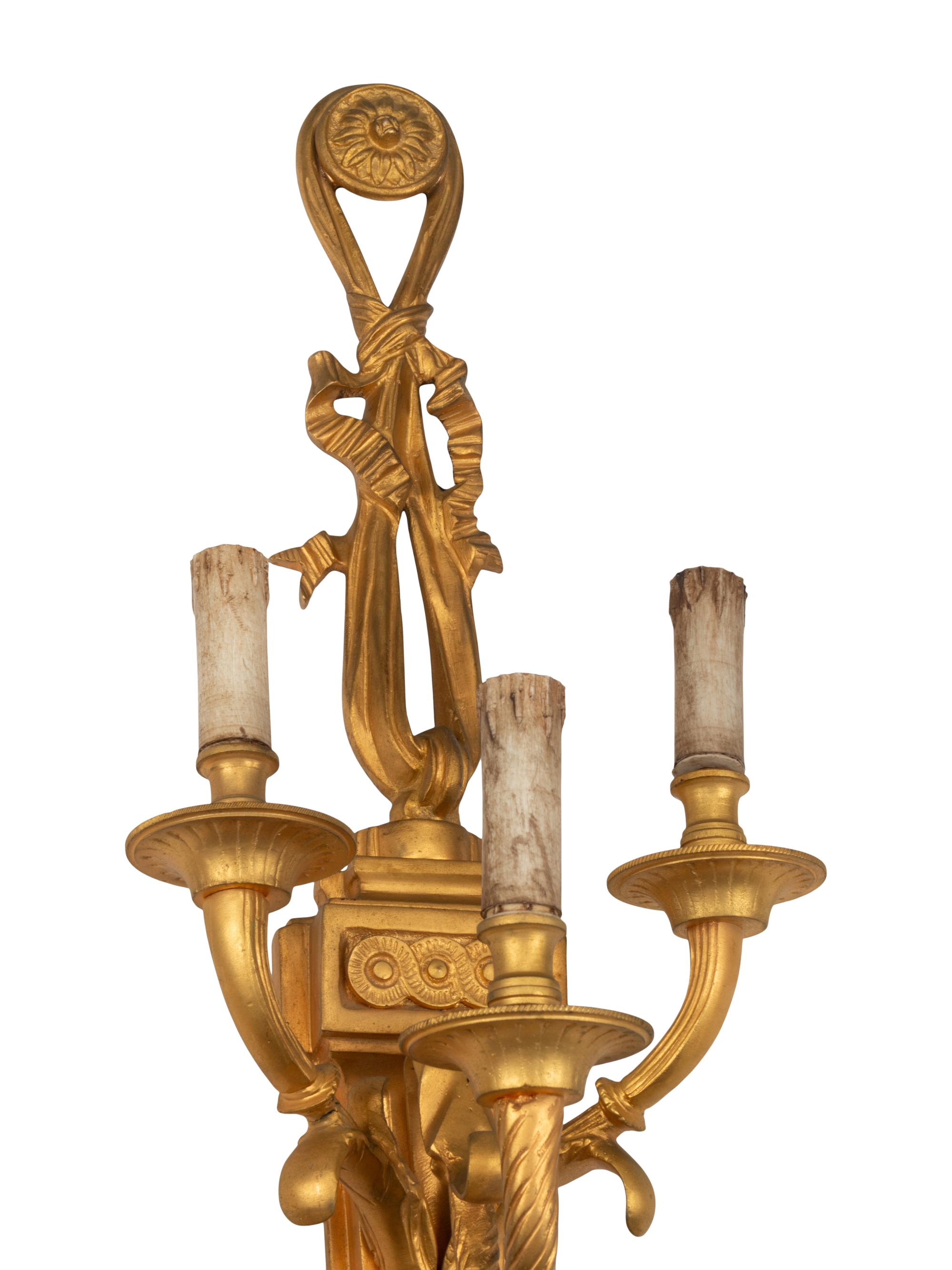 A Pair of Louis XV Style Gilt Bronze Five-Light Sconces