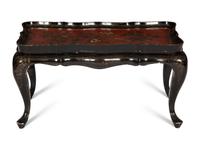 A Lacquered and Gilt Decorated Chinoiserie Tray Top Table
