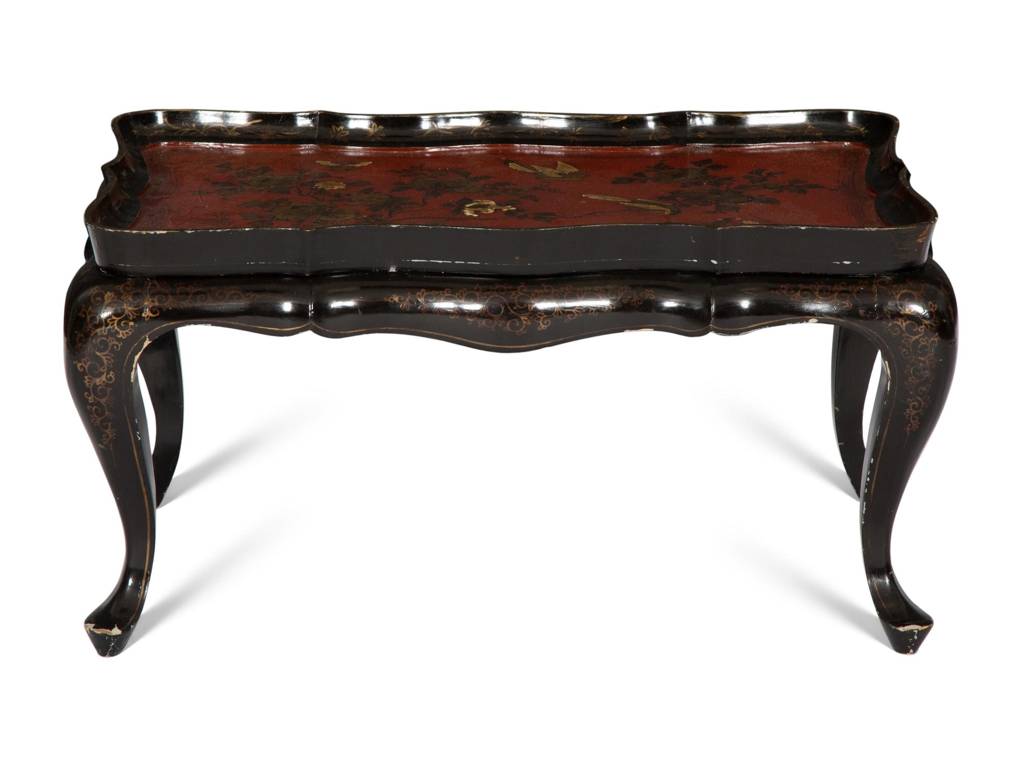 A Lacquered and Gilt Decorated Chinoiserie Tray Top Table