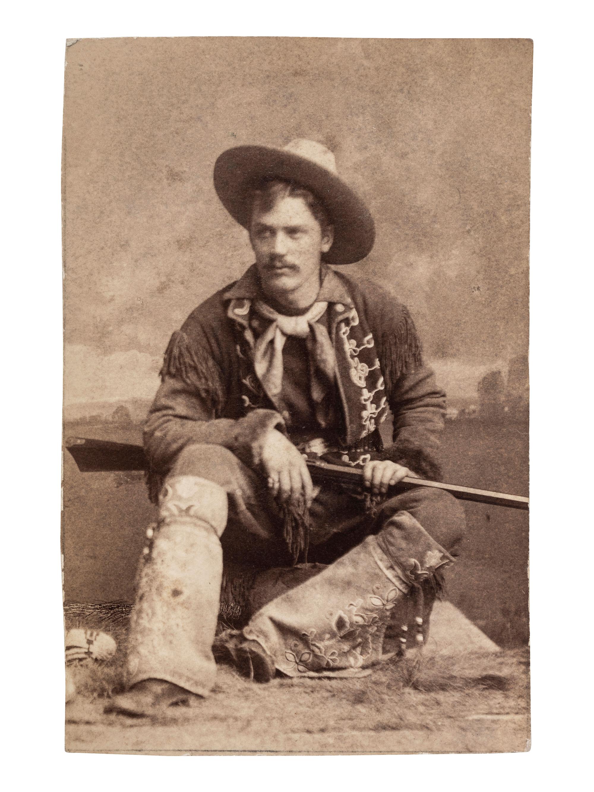 [EARLY PHOTOGRAPHY - TINTYPE]. A pair of tintypes featuring subjects in western dress, comprising: