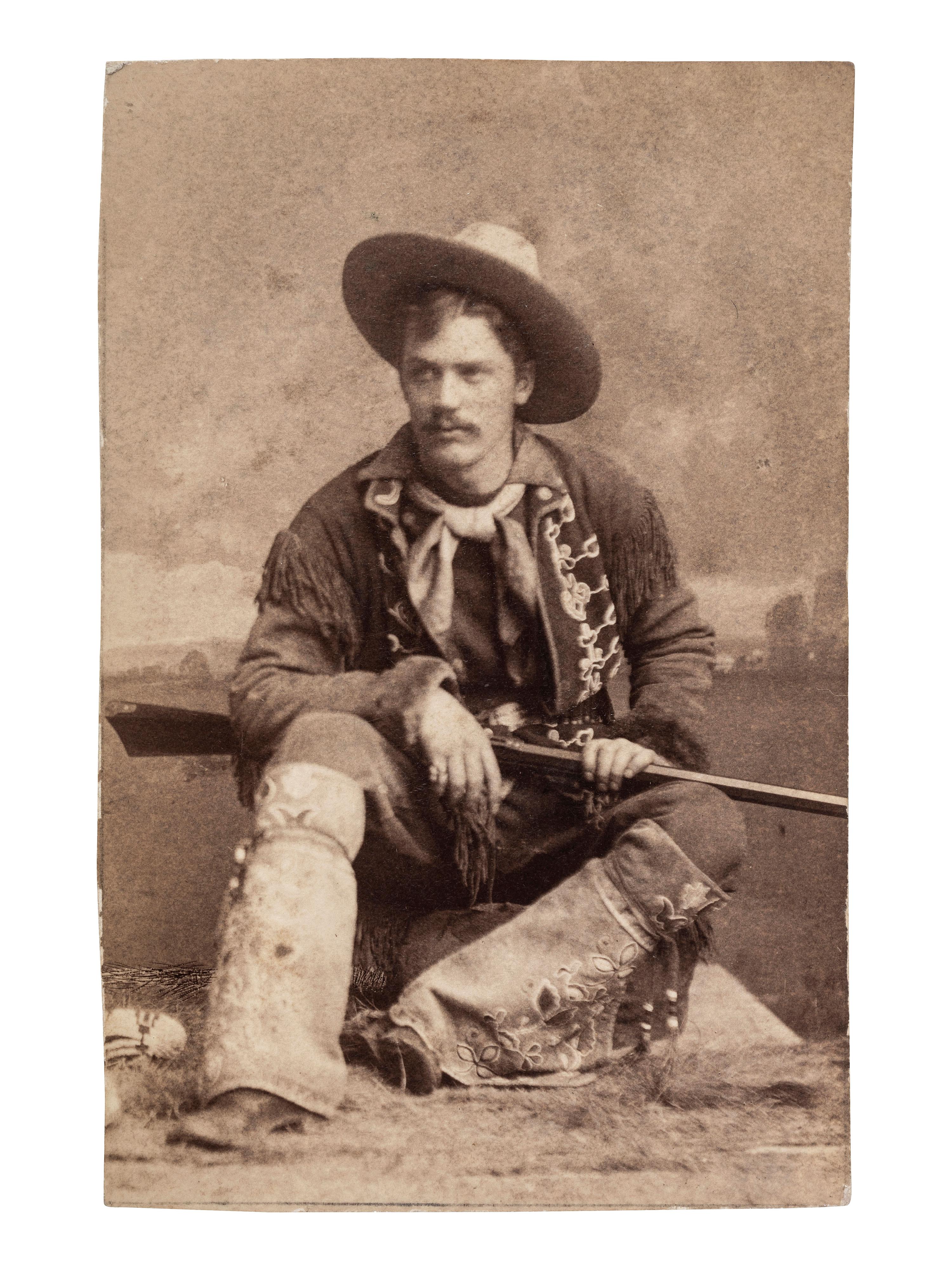 [EARLY PHOTOGRAPHY - TINTYPE]. A pair of tintypes featuring subjects in western dress, comprising: