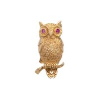 YELLOW GOLD AND SYNTHETIC RUBY OWL BROOCH