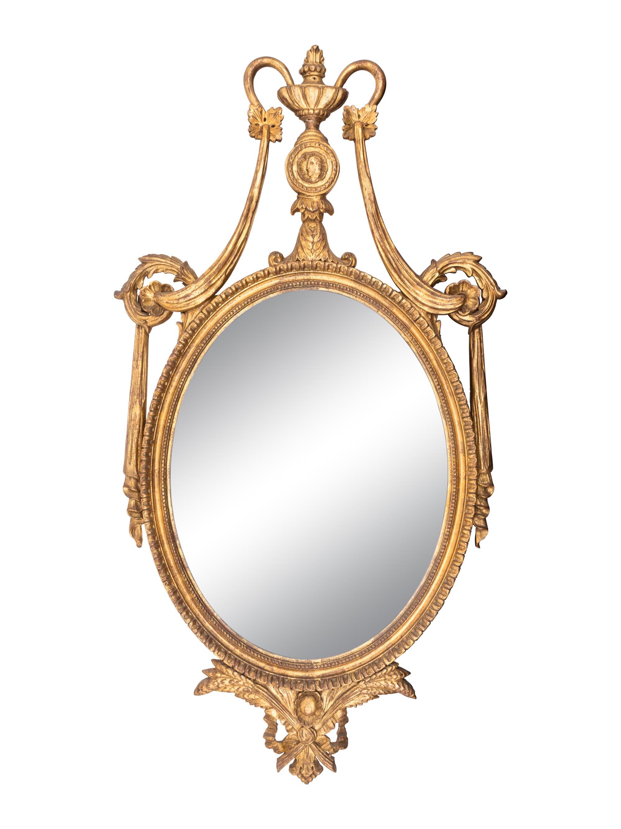 A Neoclassical Style Oval Giltwood Mirror — LATE 19TH CENTURY