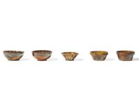 Three Glazed and Manganese Splashed Miniature Turk's Hat Redware Pudding Molds, Pennsylvania, 19th Century