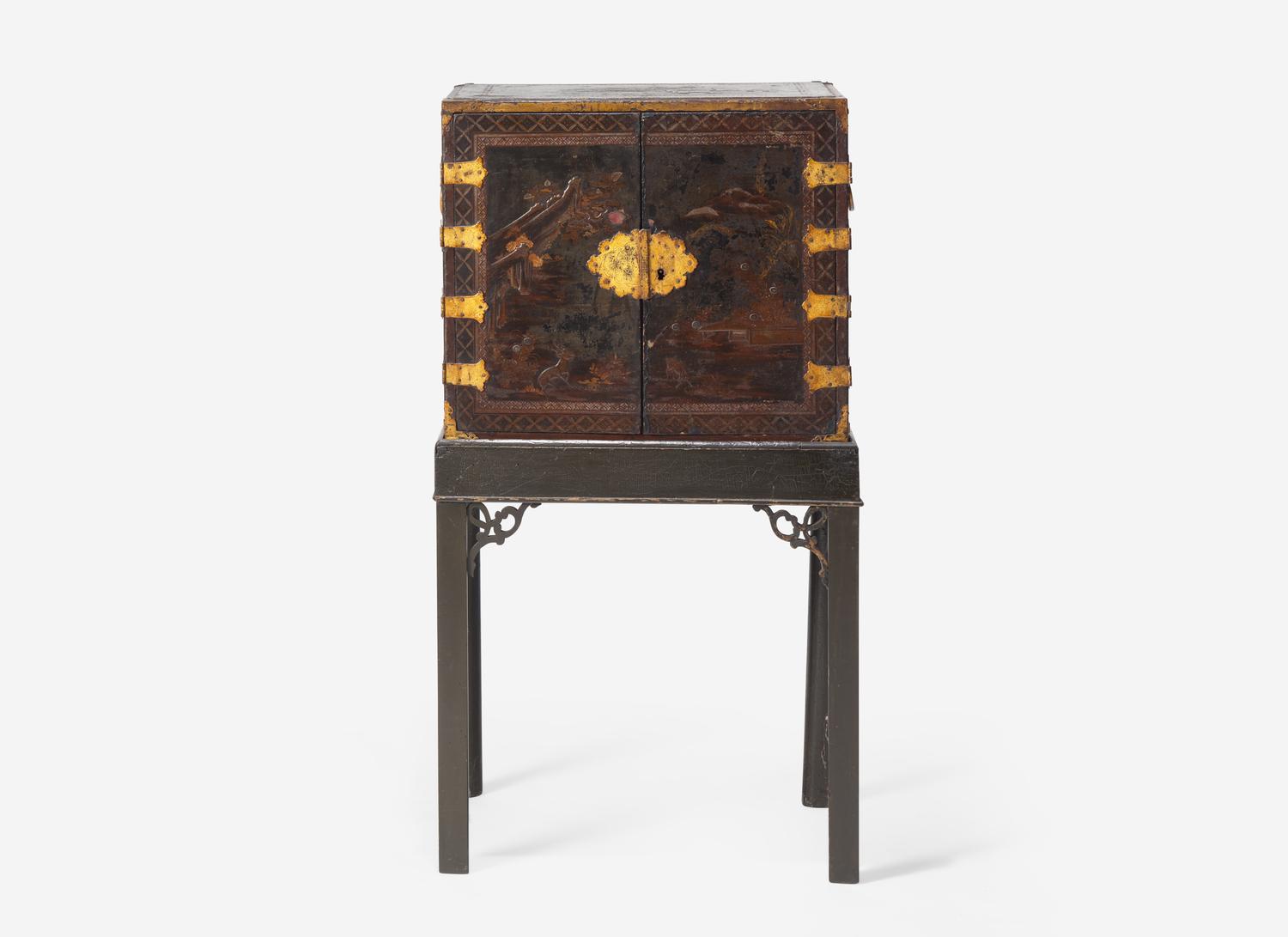 A George III Parcel Gilt Japanned Cabinet on Stand