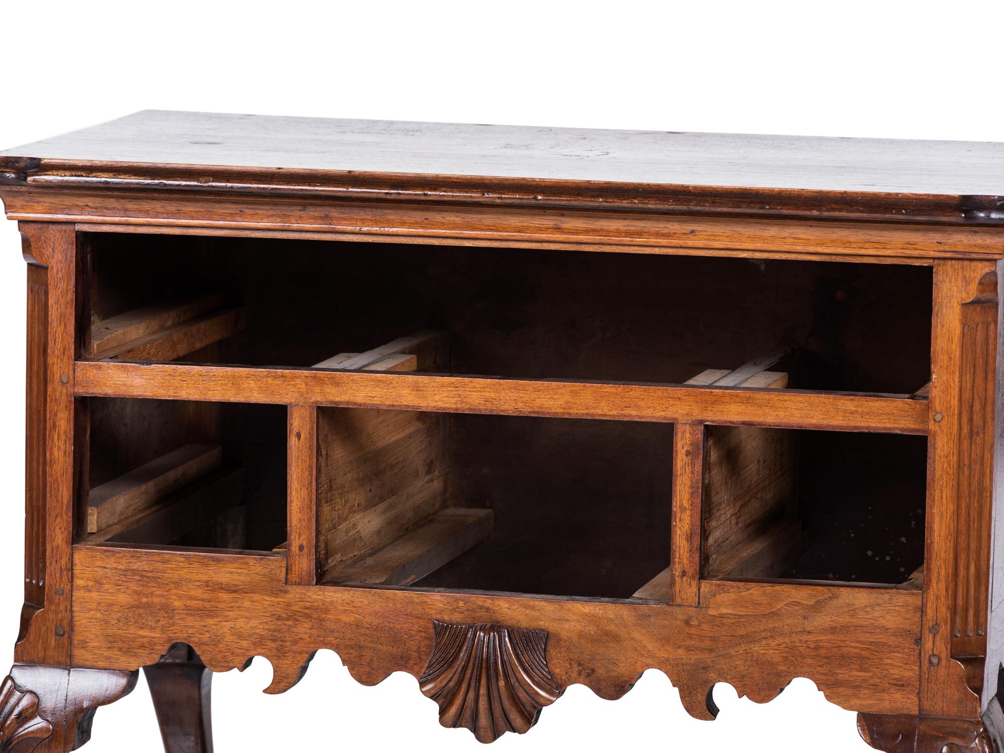 A Chippendale Style Carved Walnut Claw-and-Ball Foot Dressing Table — LIKELY LATE 19TH/EARLY 20th CENTURY INCORPORATING EARLIER ELEMENTS