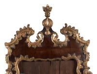 A George II Walnut and Parcel Gilt Mirror