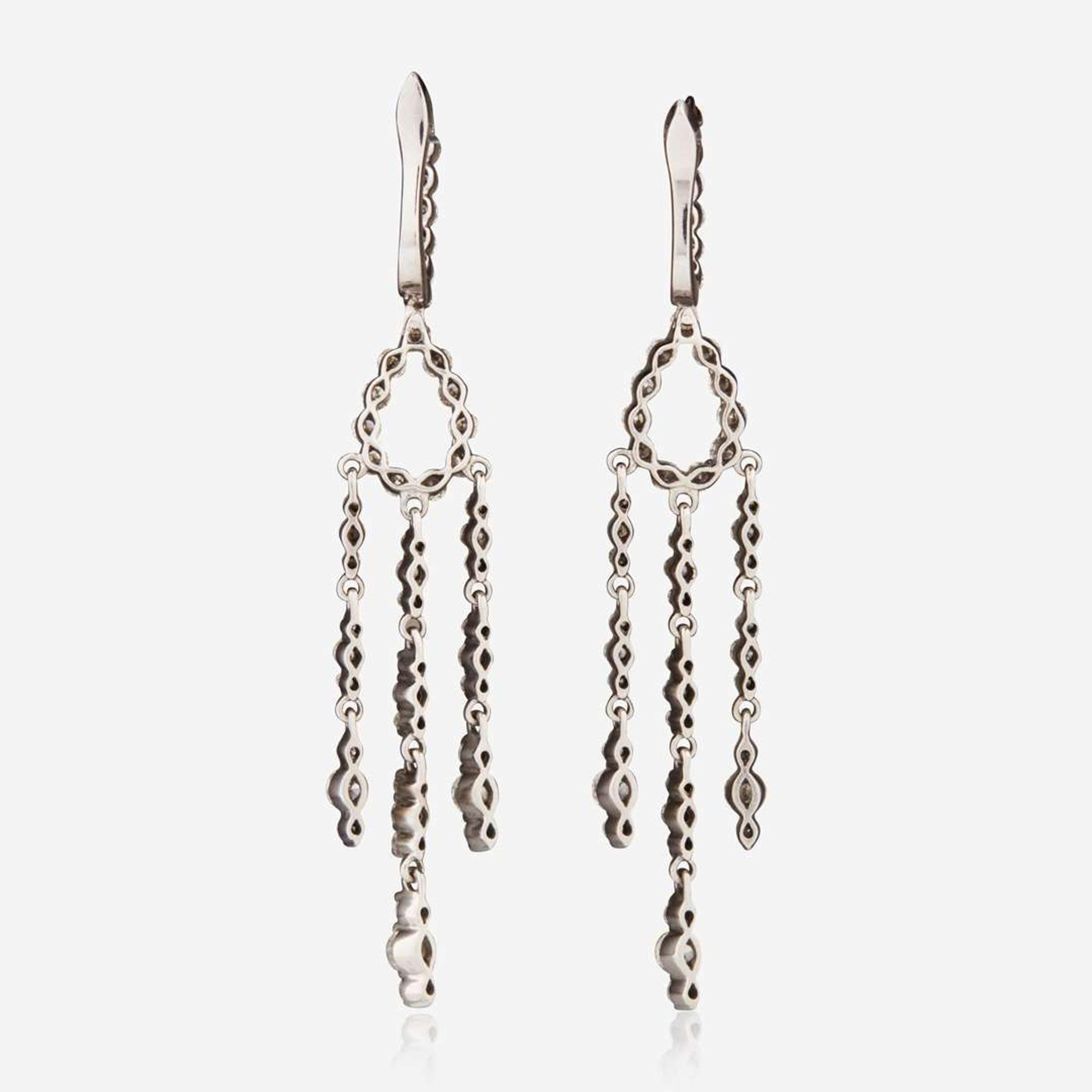 A Pair of 18K White Gold and Diamond Earrings