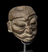 A Maya Terracotta Head from a Figural Vessel
