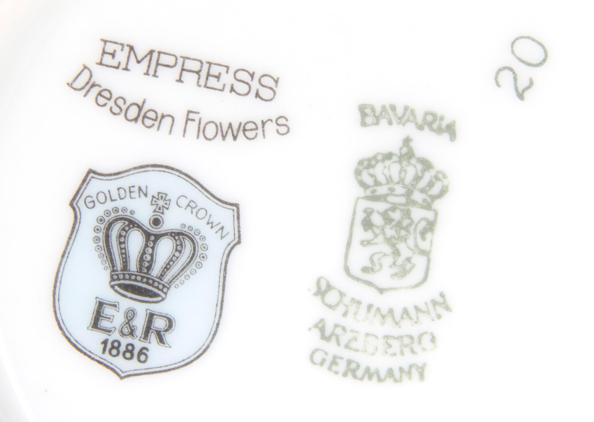 A Bavarian Porcelain Partial Dinner Service for Twelve, Schumann, Diameter of dinner plate 11 inches.