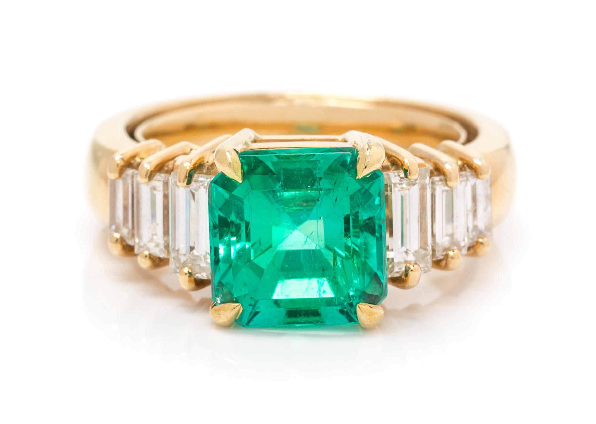 An 18 Karat Yellow Gold, Emerald and Diamond Ring, 6.70 dwts.