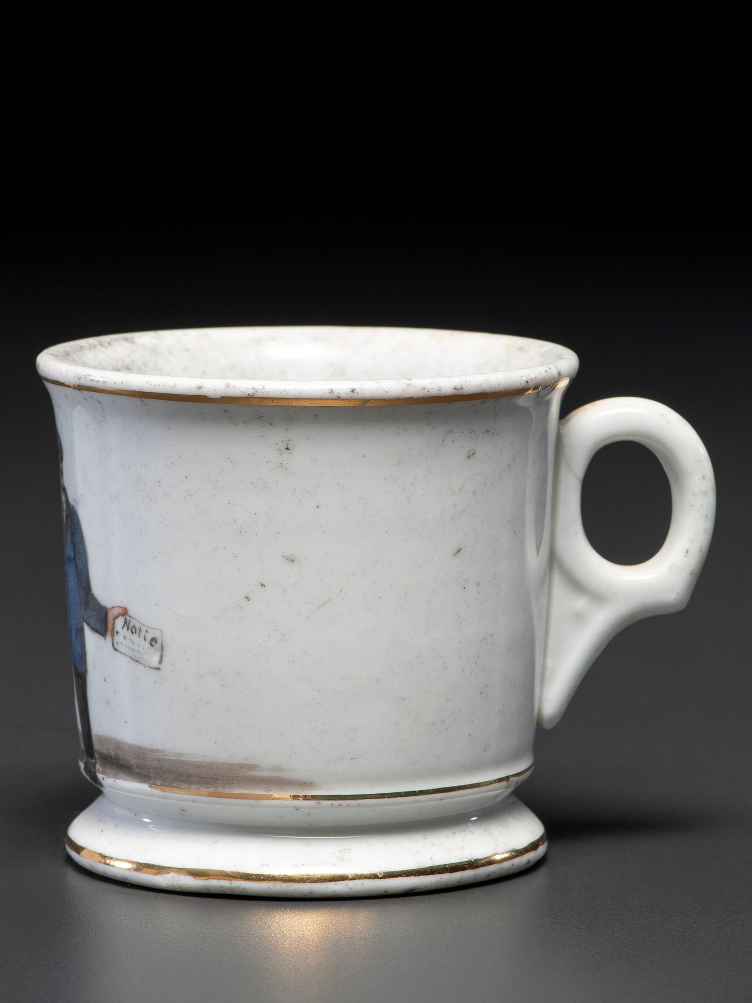 An Unusual Porcelain Occupational Shaving Mug Depicting a One-Legged Man