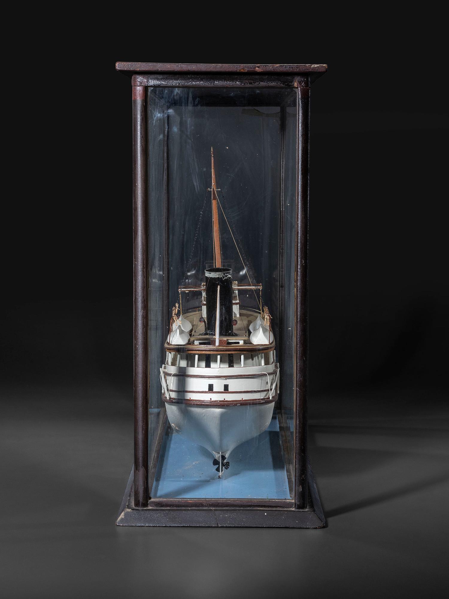 A Painted Wood Cased Steamboat Model