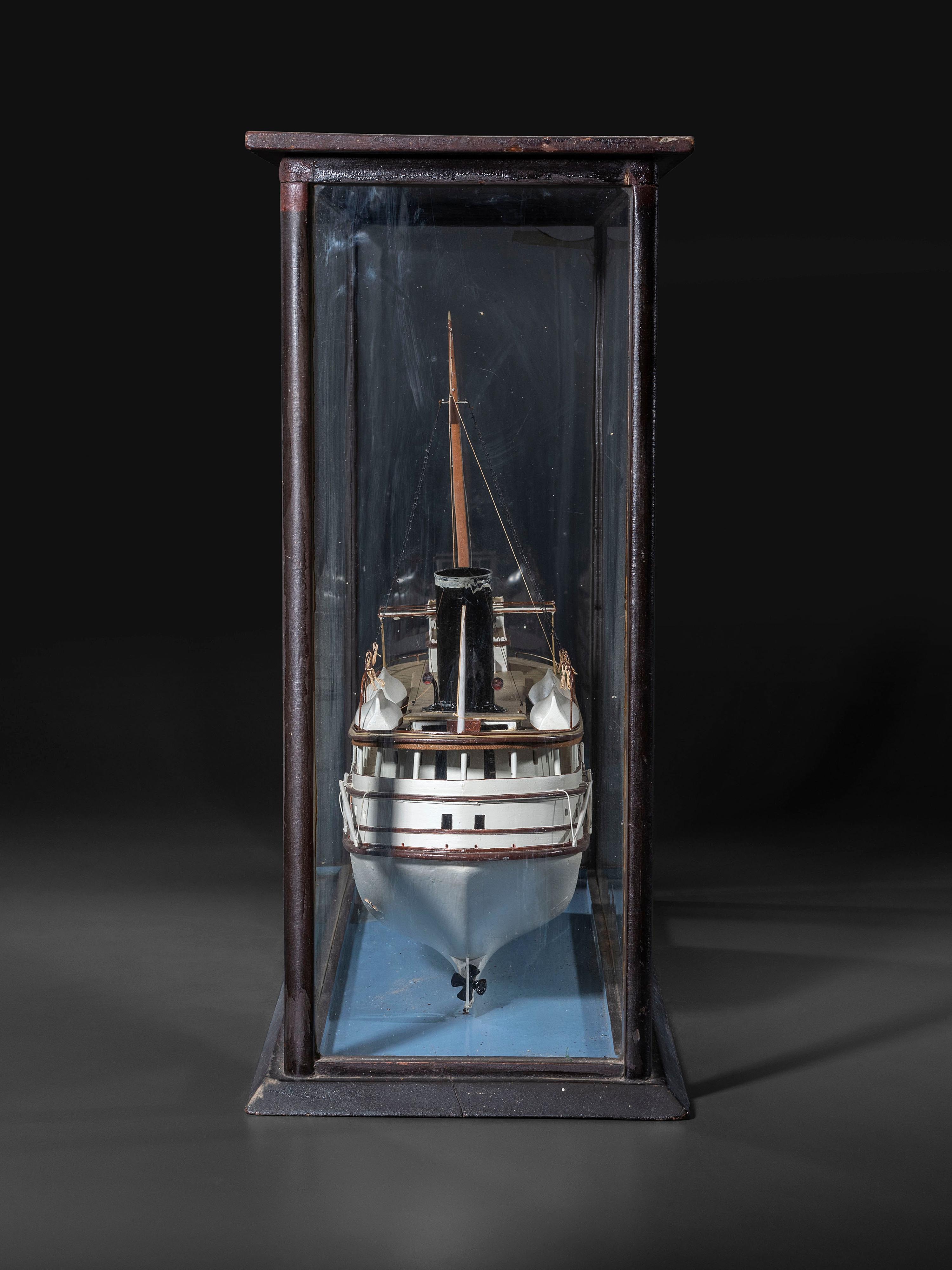 A Painted Wood Cased Steamboat Model