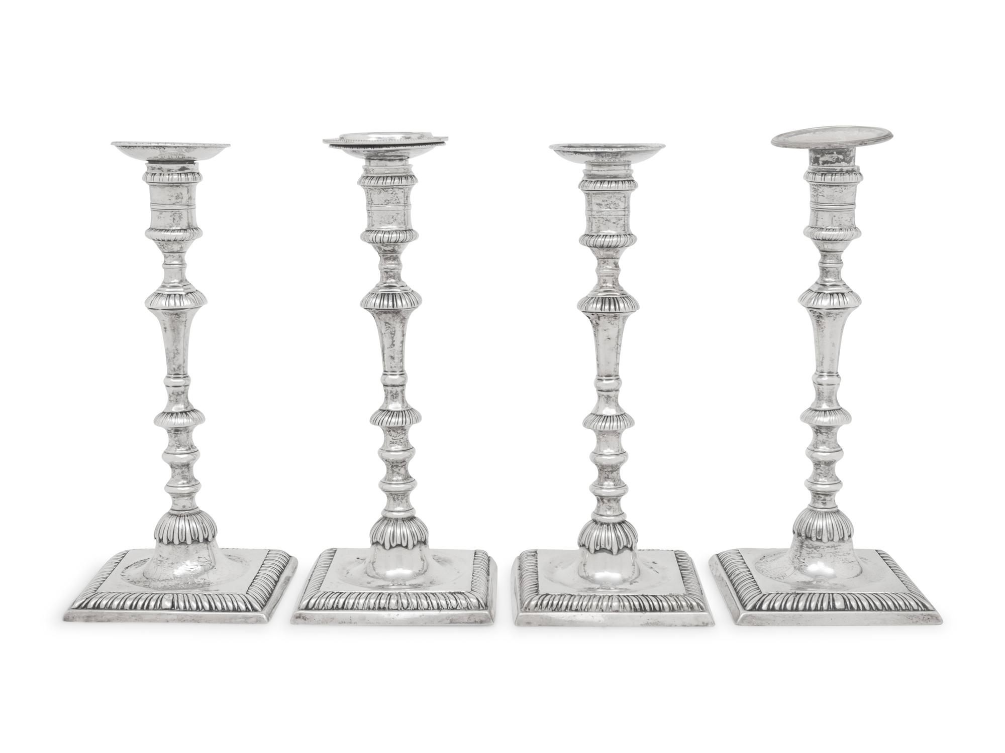 An Assembled Set of Four George III Silver Candlesticks