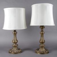 A Pair of Silvered Metal Lamps, Height overall 28 3/4 inches.