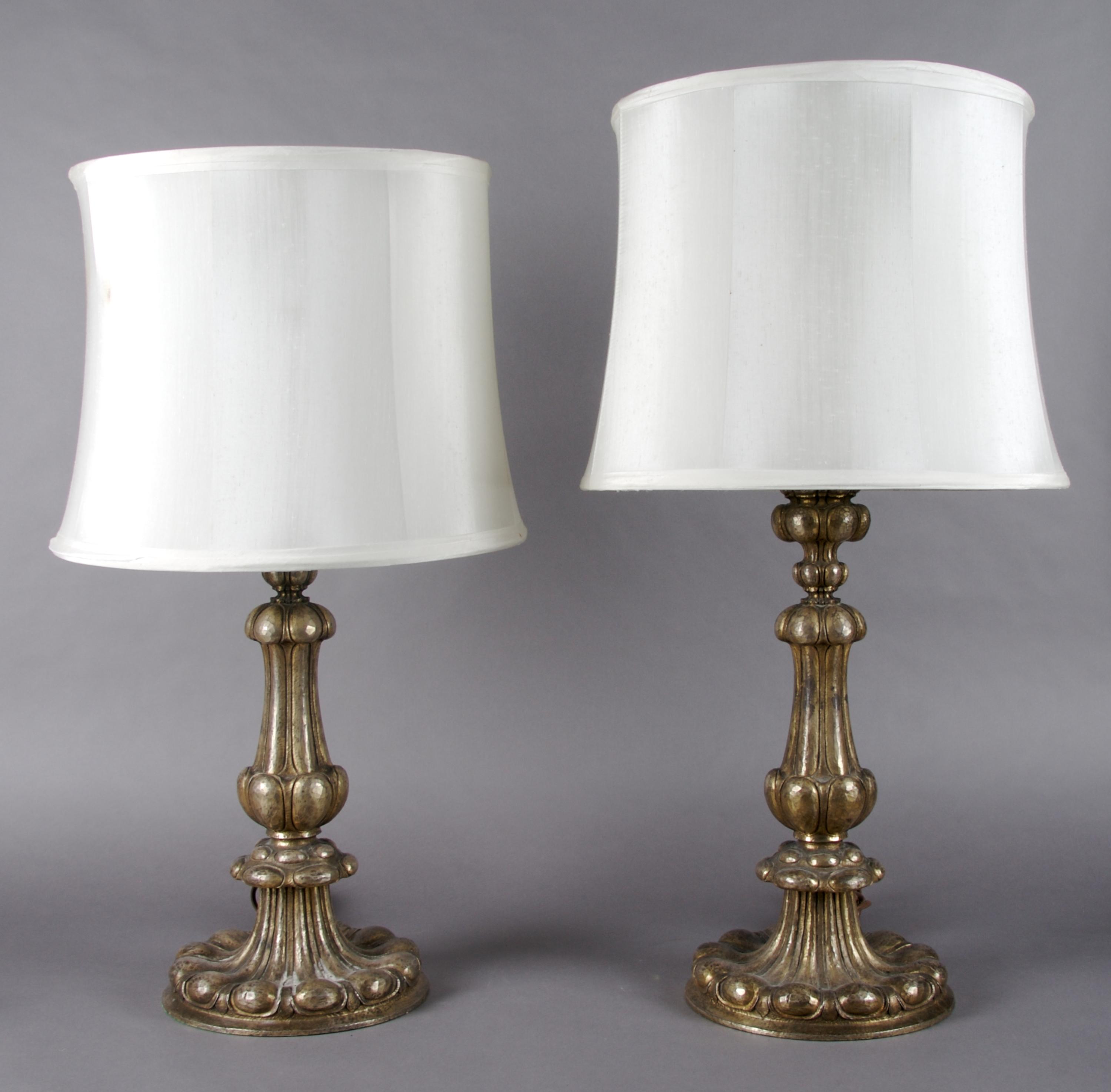 A Pair of Silvered Metal Lamps, Height overall 28 3/4 inches.