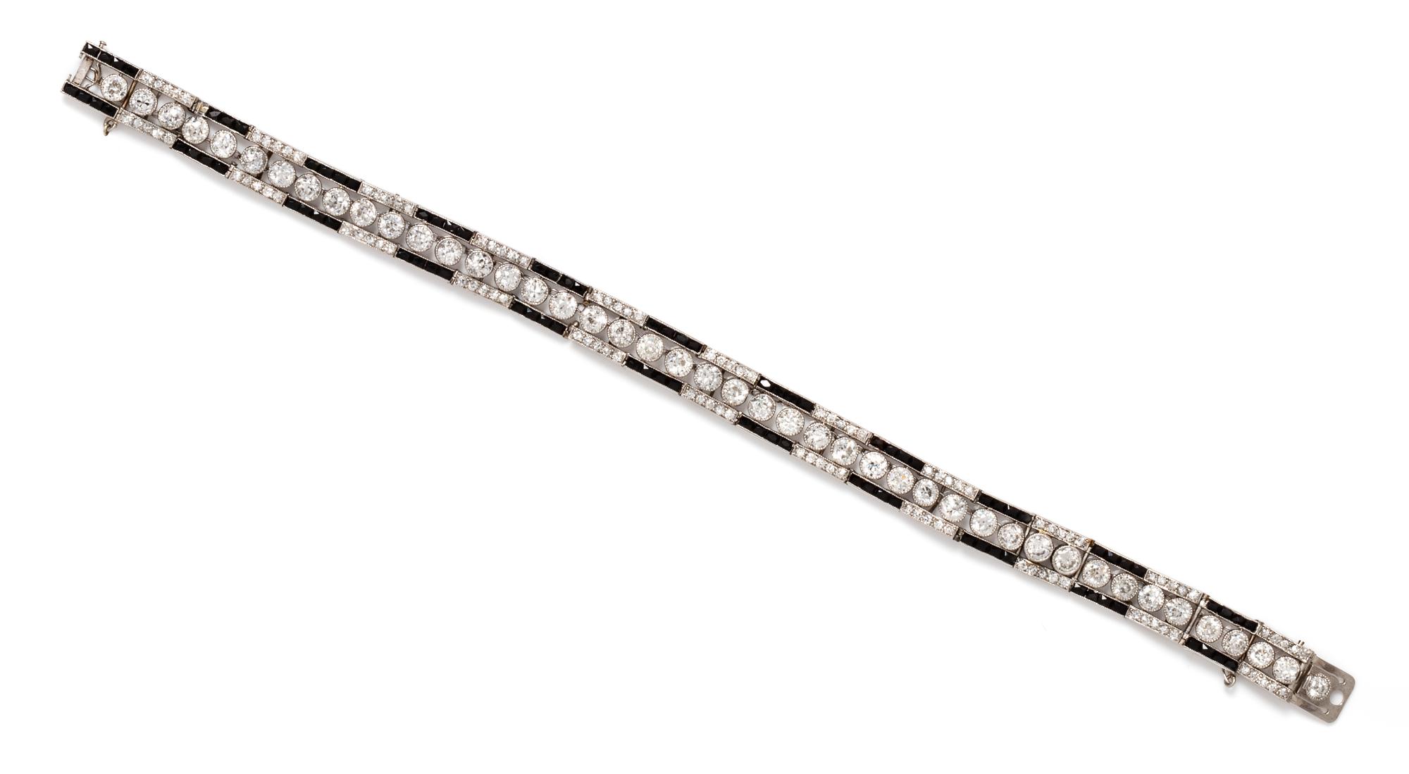 An Art Deco Platinum, Diamond and Onyx Bracelet, 12.23 dwts.
