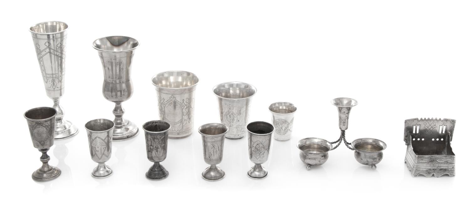 A Collection of Russian Silver Table Articles, Various Makers, comprising 5 cordials, 3 beakers, 2 chalices and 2 salts; 12 items total