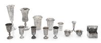 A Collection of Russian Silver Table Articles, Various Makers, comprising 5 cordials, 3 beakers, 2 chalices and 2 salts; 12 items total