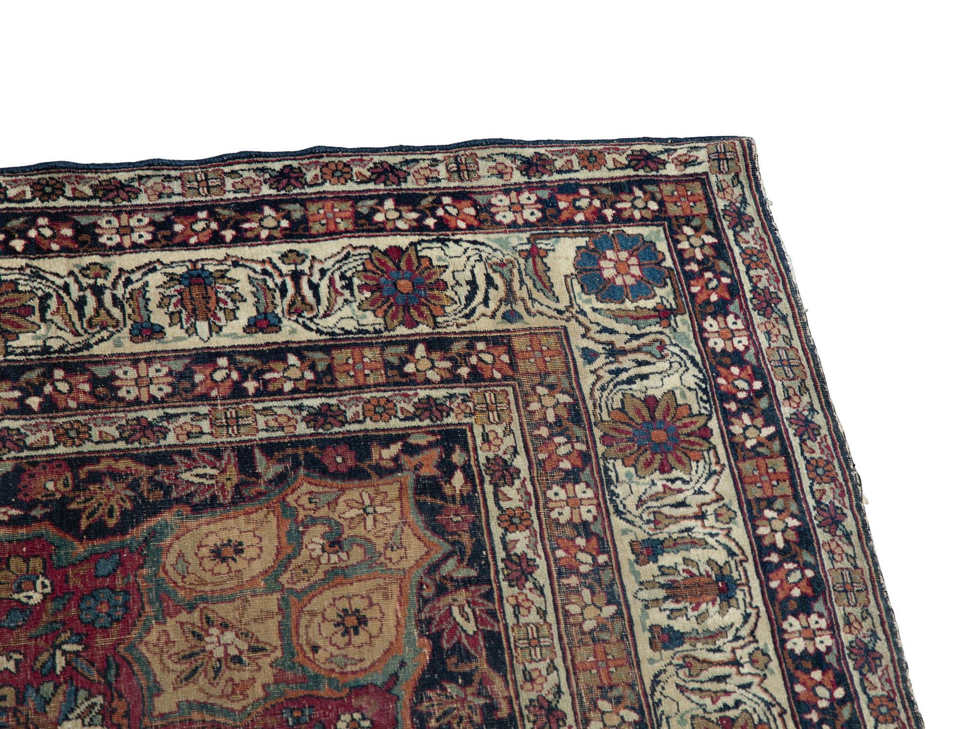 A Tabriz Wool Rug