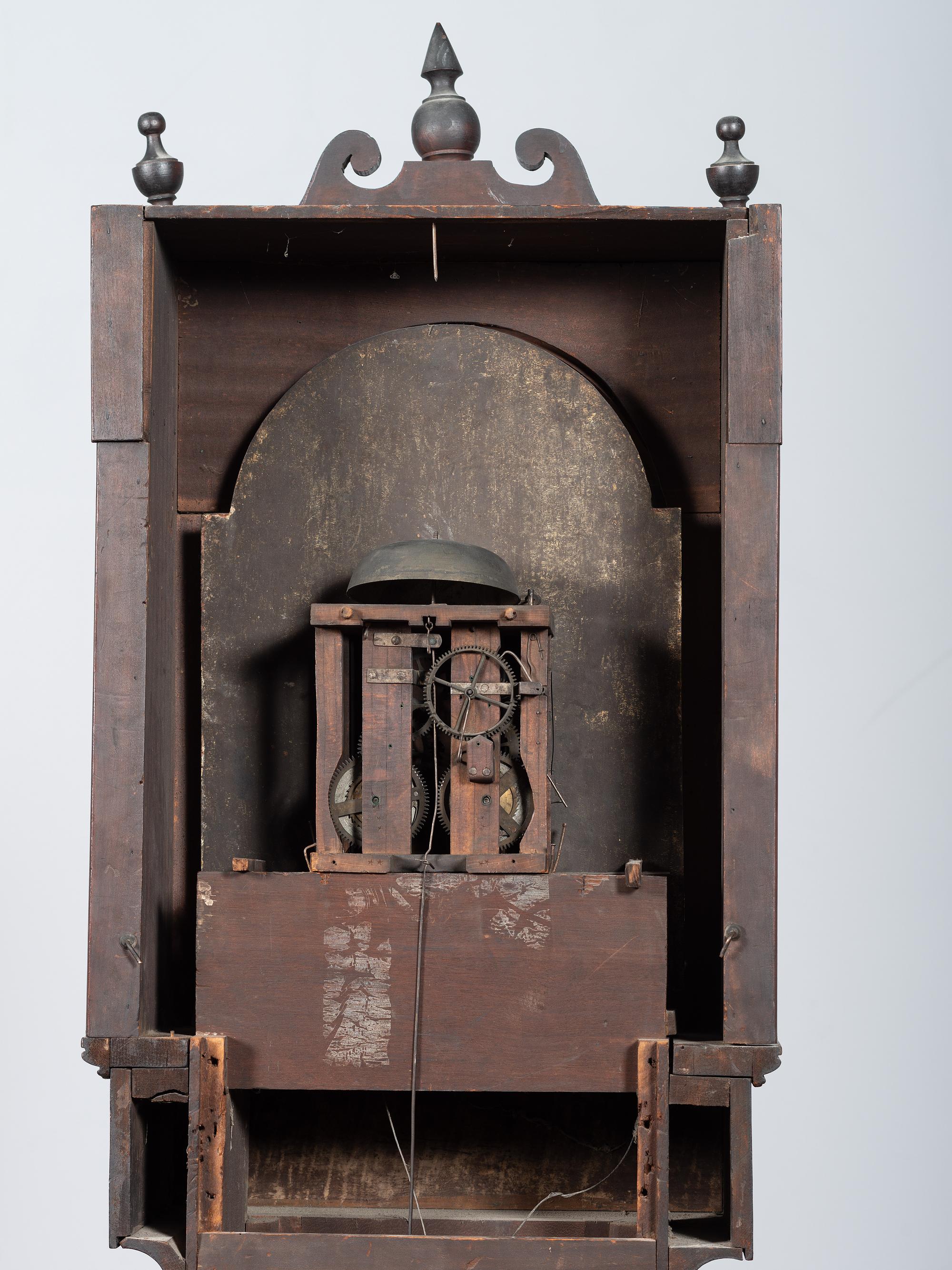 A Chippendale Cherrywood and Tiger Maple Tall Case Clock