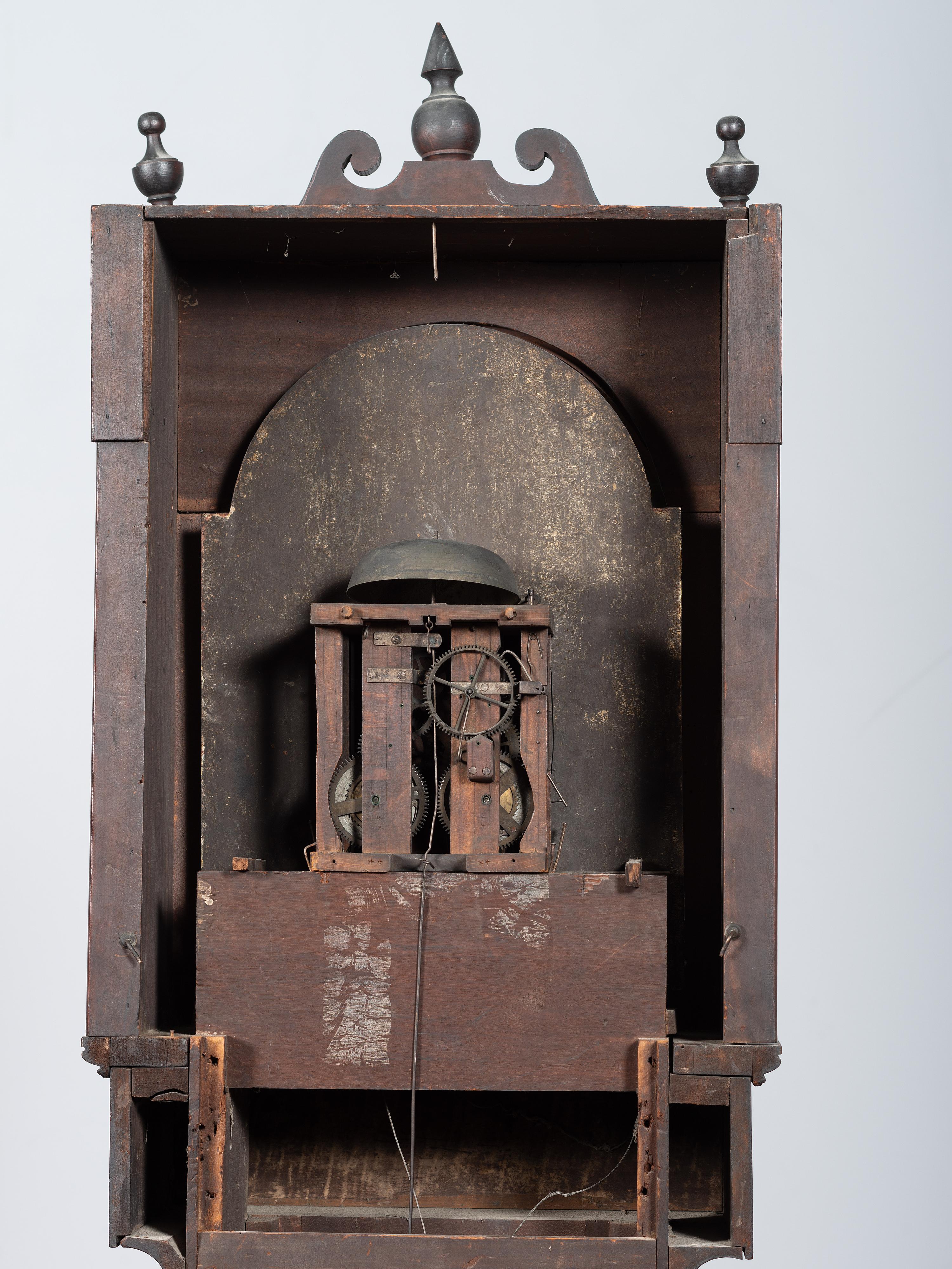 A Chippendale Cherrywood and Tiger Maple Tall Case Clock