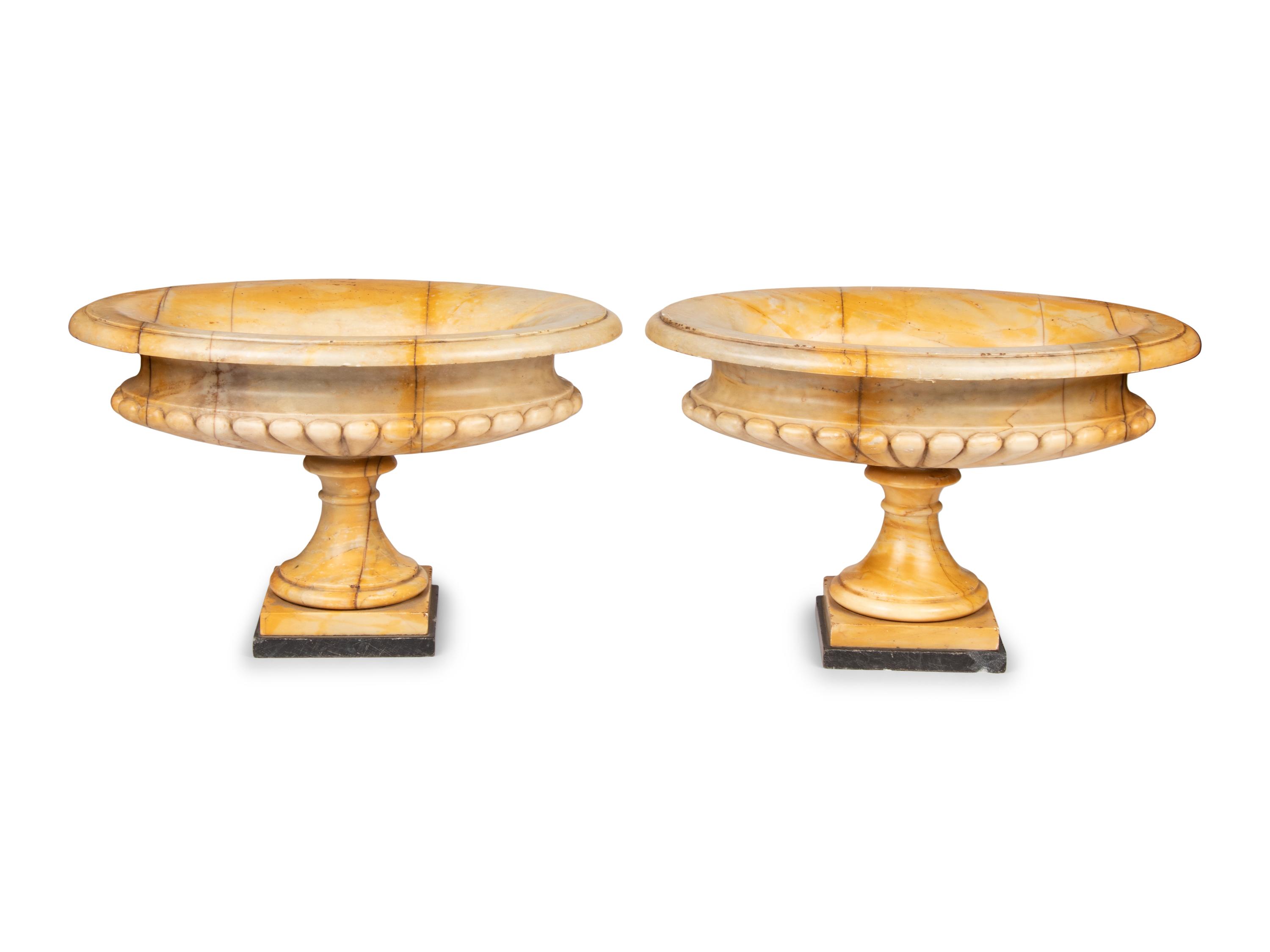A Pair of Neoclassical Style Gadrooned Sienna Marble Urns