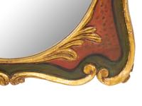 An Italian Painted and Parcel Gilt Mirror