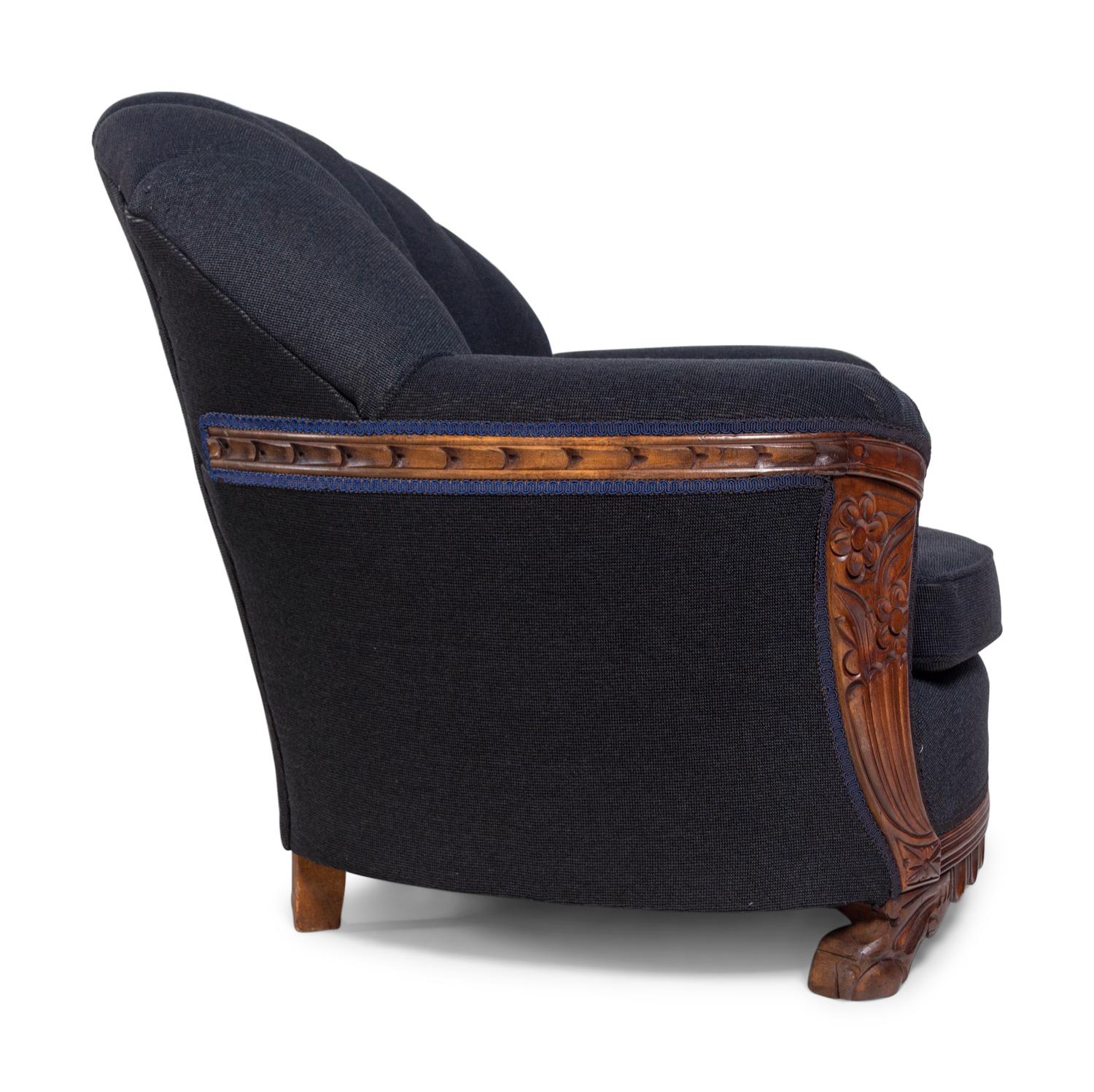 An Art Deco Style Carved Walnut Sofa and Armchair