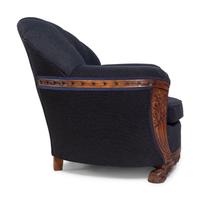 An Art Deco Style Carved Walnut Sofa and Armchair