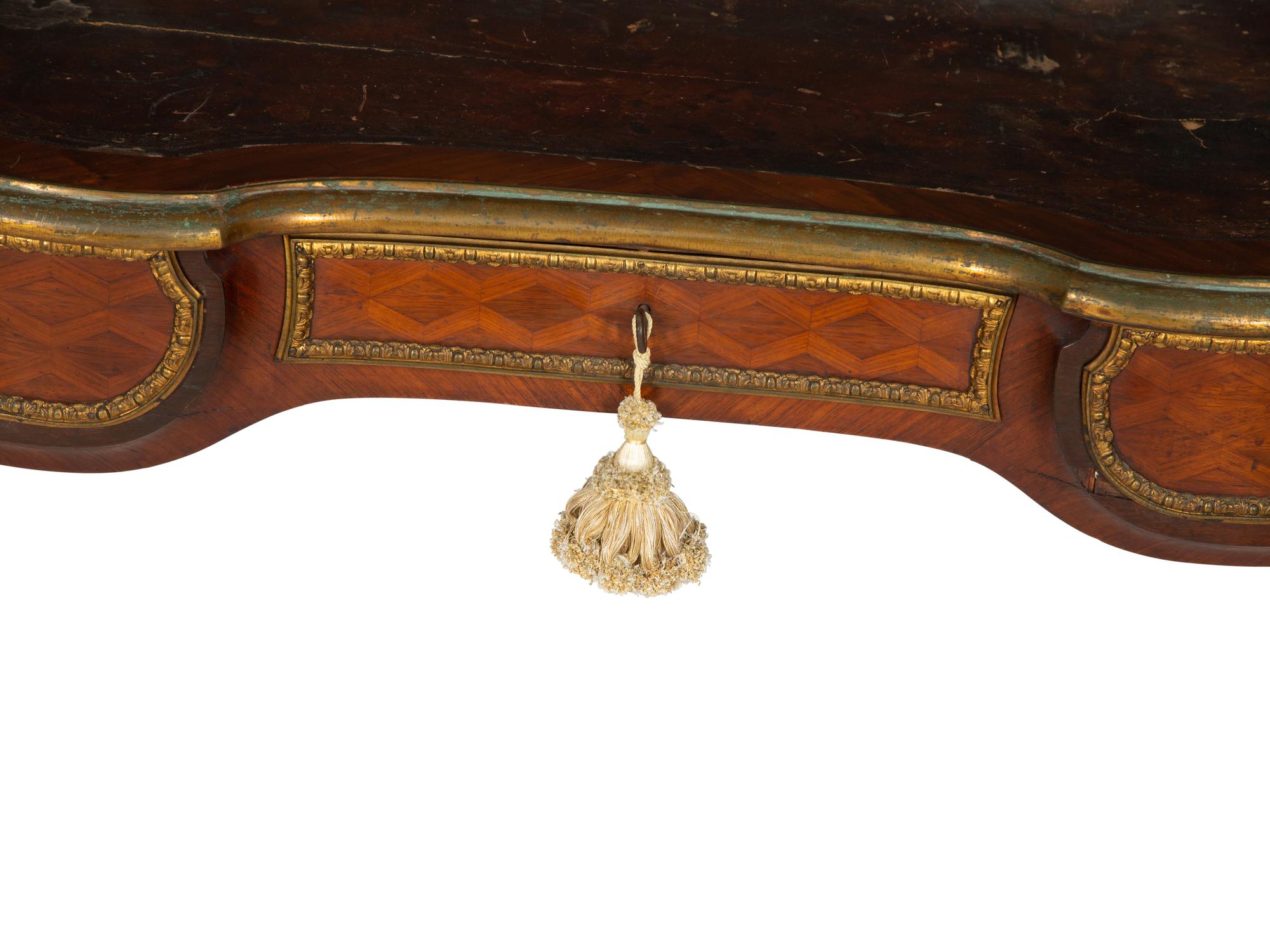 A Louis XV Style Gilt Bronze Mounted Parquetry Bureau Plat