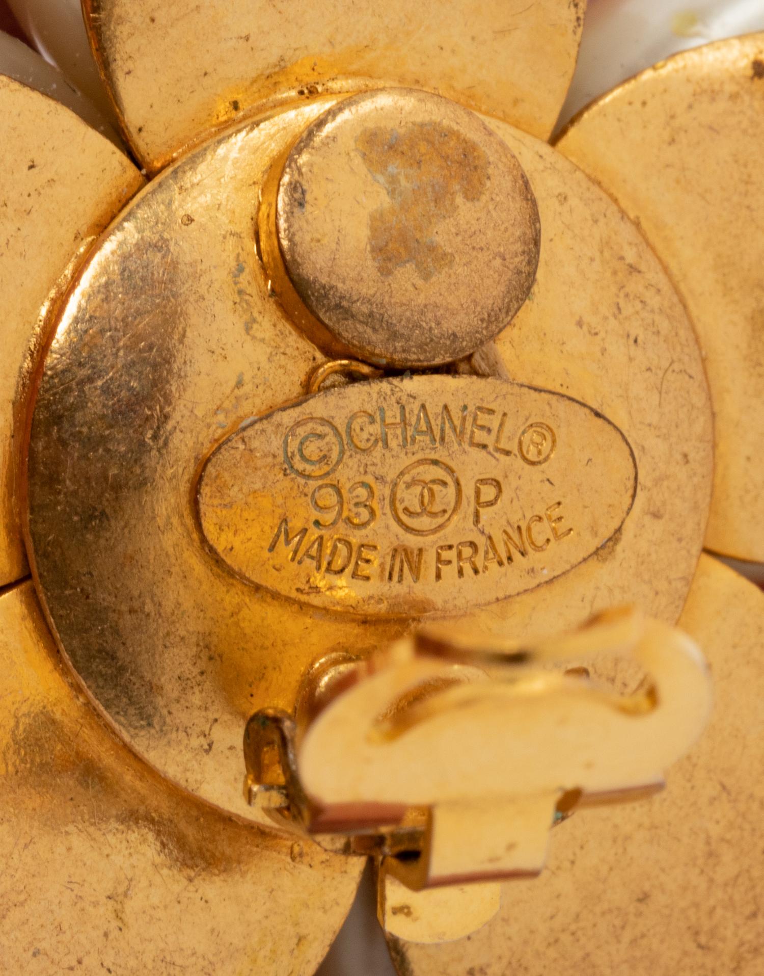 Four Chanel Accessories: Three Ear Clips & One Camellia Pin, 1980-90s