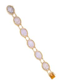 A 14 Karat Yellow Gold and Lavender Jade Bracelet, Gump's, 22.80 dwts.