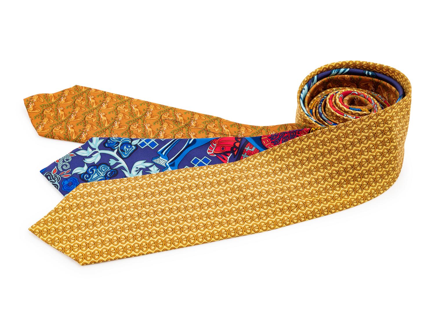 Three Hermes silk ties, one blue, one yellow, one brown