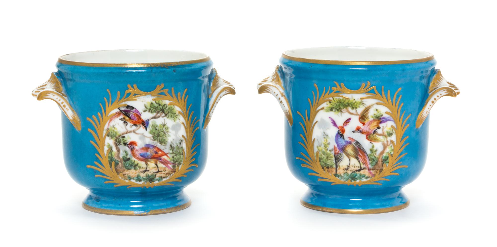 A Pair of Sevres Style Porcelain Cache Pots Height 4 1/2 inches.