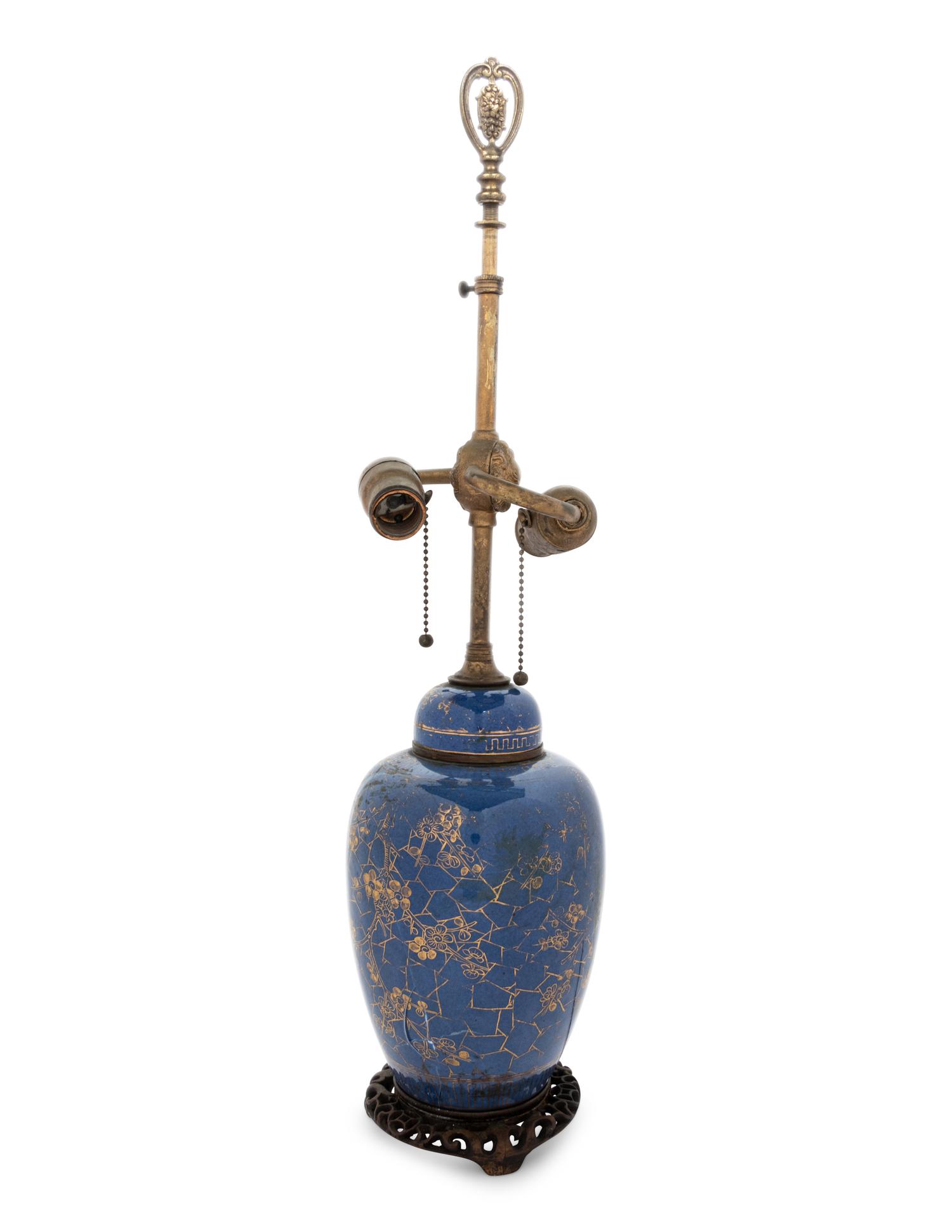 A Chinese Powder Blue Ground Gilt Decorated Ginger Jar and Cover