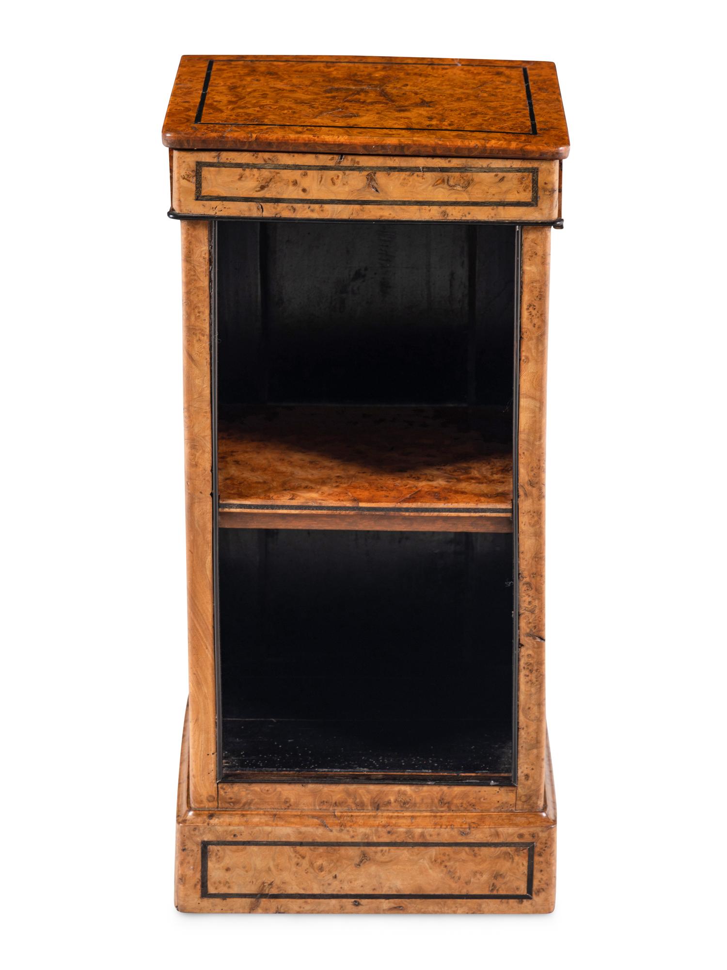 A Charles X Burlwood Pedestal Bookcase