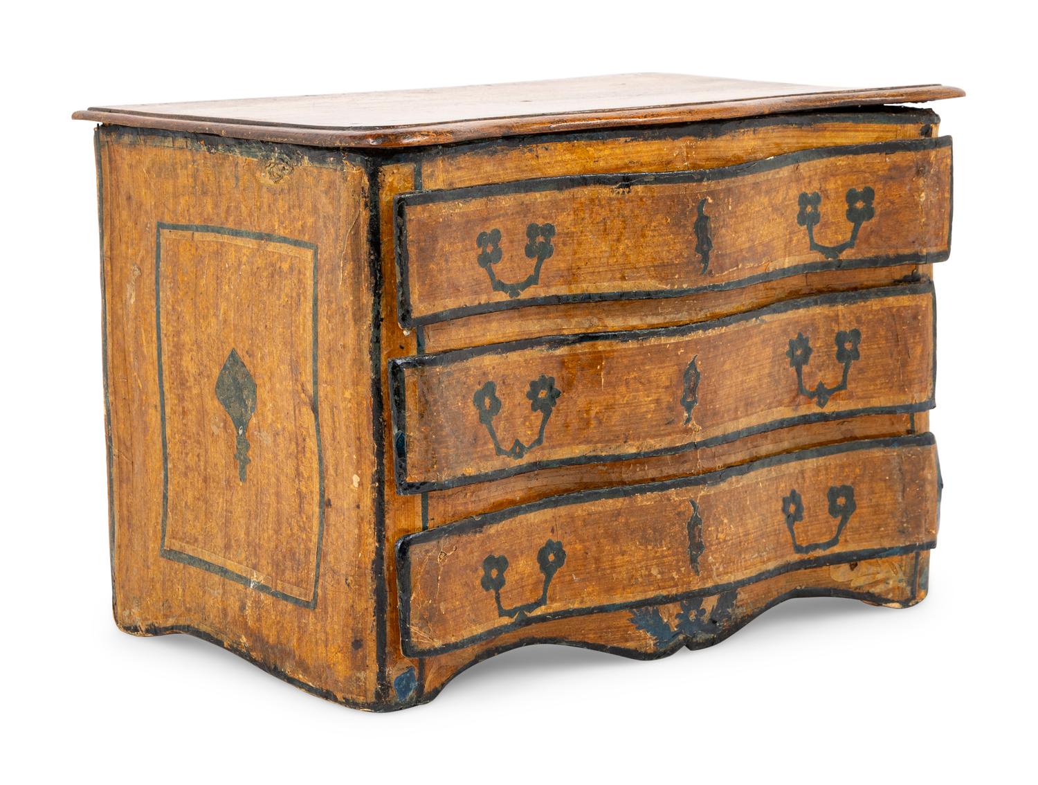 A Papier-Mâché Diminutive Chest of Drawers