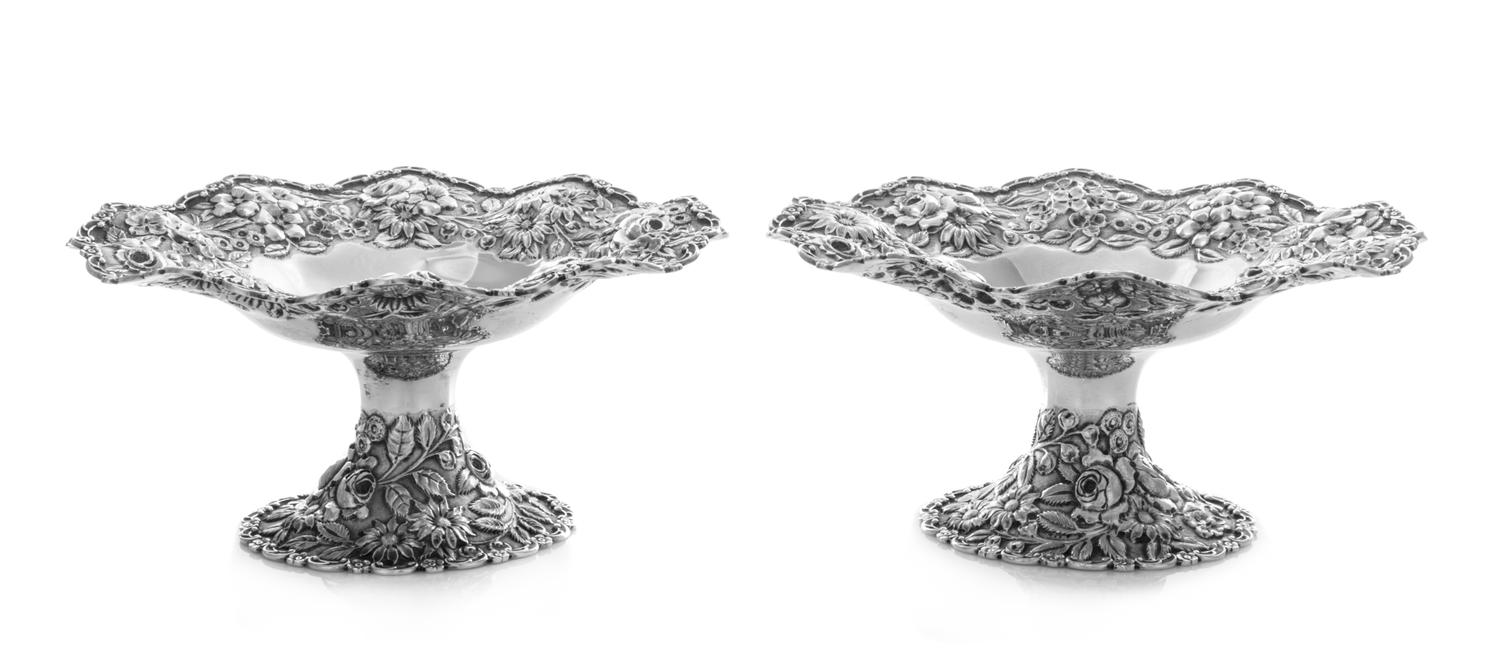 A Pair of American Silver Compotes, S. Kirk & Son, Baltimore, MD, each rim worked to show rocaille and S-scrolls enclosing the floral a