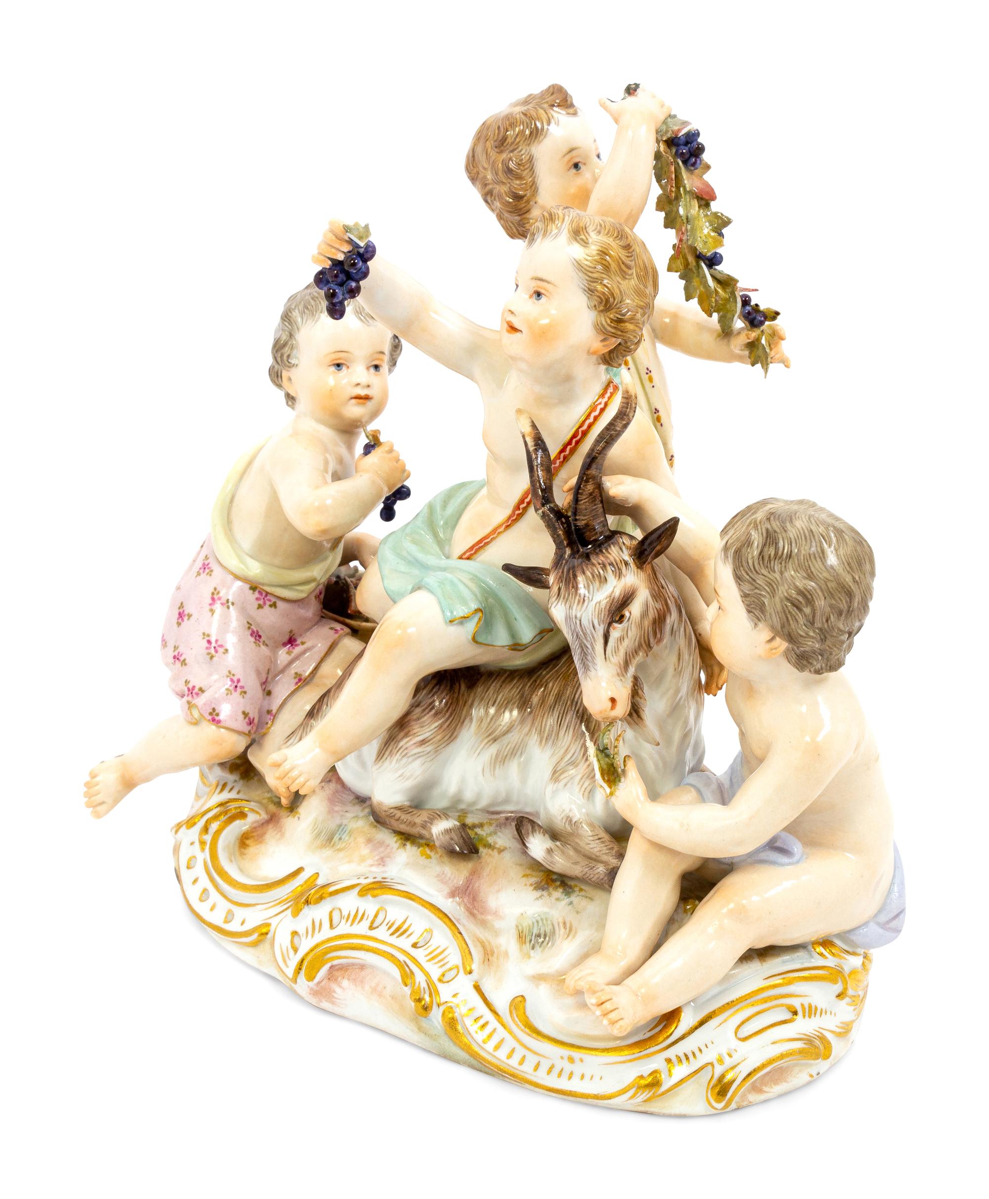 A Meissen Porcelain Group of Children Feeding a Goat