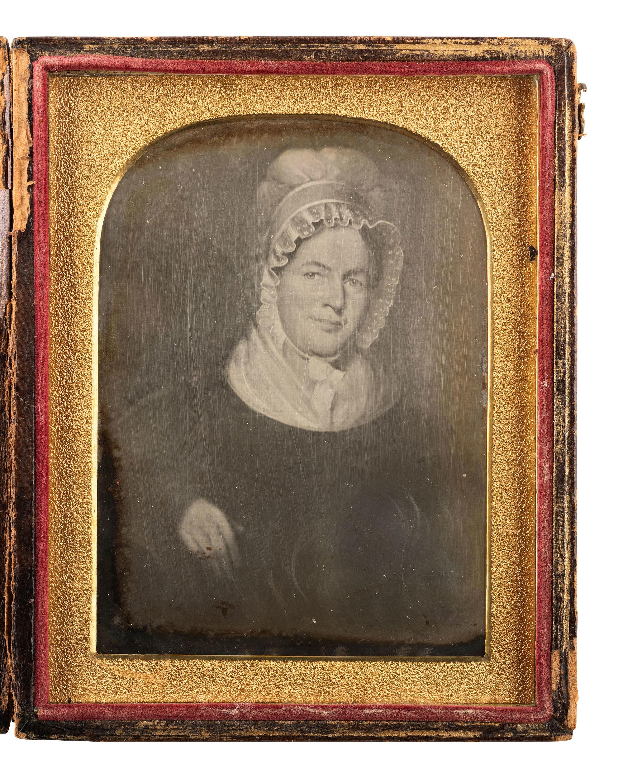 [EARLY PHOTOGRAPHY]. Two cased images of paintings, highlighted by a ninth plate ambrotype of a miniature portrait by Rufus Porter (1792-1884).