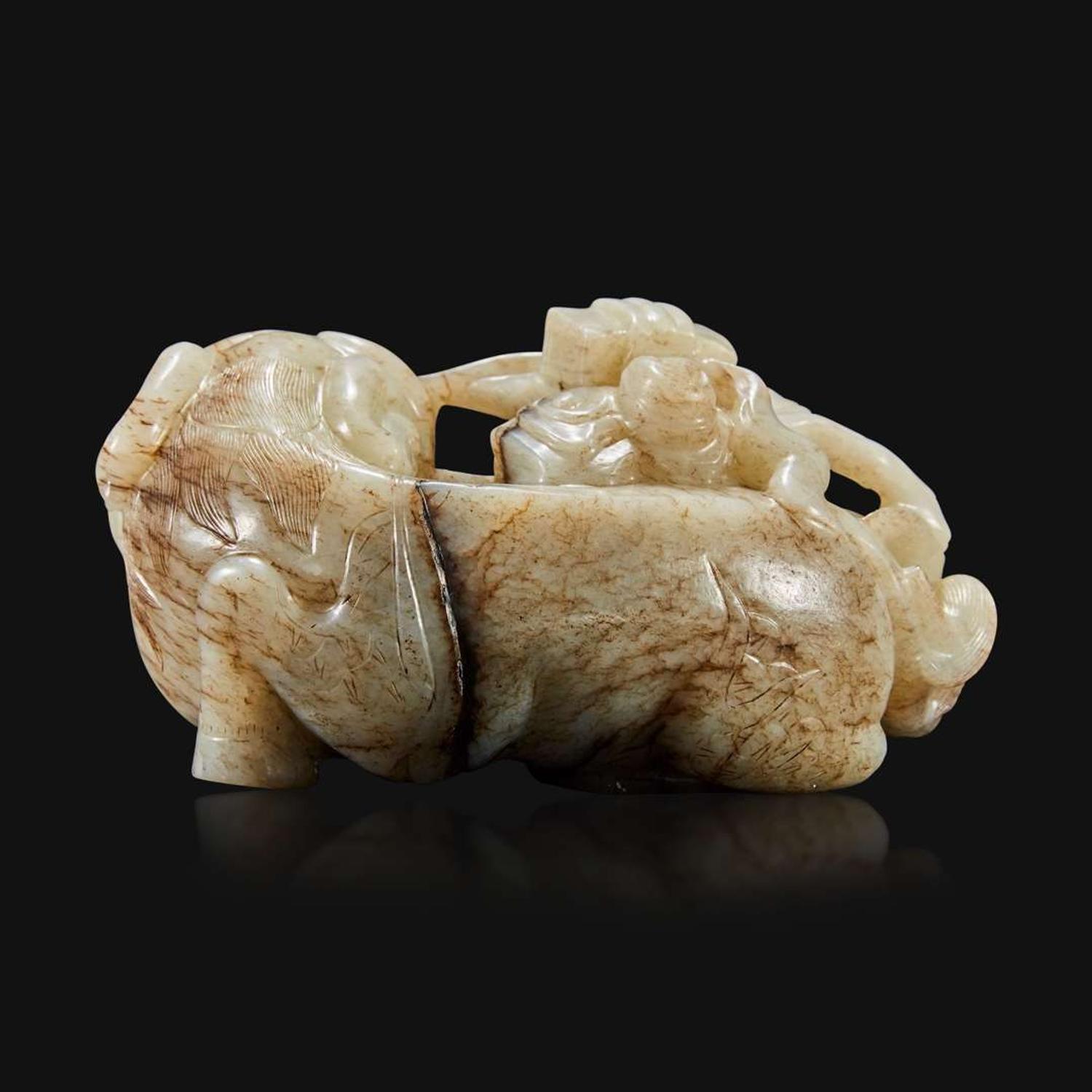 A Chinese carved jade figure of recumbent qilin