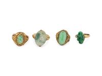 Four Chinese Silver-Gilt Mounted Jadeite Rings