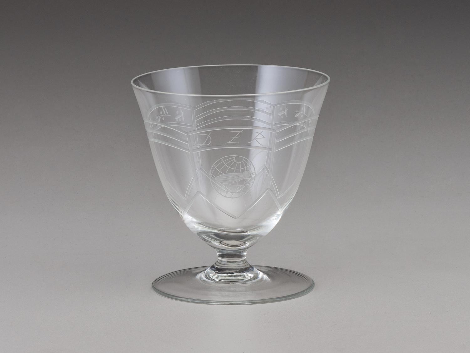 [TRANSPORTATION] - [ZEPPELIN]. Set of Deutsche Zeppelin-Reederei porcelain with dinner plates, salad plates, and sherbet glasses.
