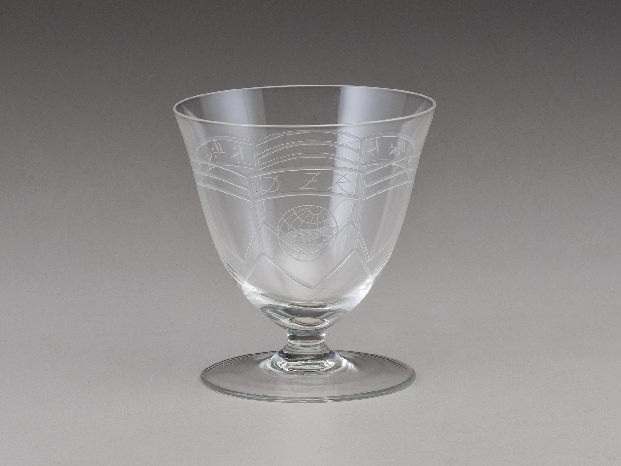 [TRANSPORTATION] - [ZEPPELIN]. Set of Deutsche Zeppelin-Reederei porcelain with dinner plates, salad plates, and sherbet glasses.