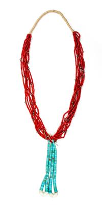 A Navajo Seven Strand Coral Necklace Length of necklace 28 inches; jocla 6 inches.