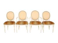 A Set of Eight Louis XVI Style Painted Oval-Back Dining Chairs
